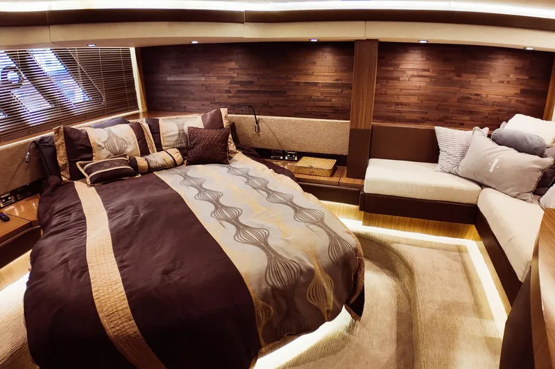 Slide: The Image of Luxurious 2016 Sea Ray L590 Fly yacht cockpit with modern controls and plush seating. - 12