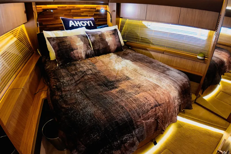 Slide: The Image of Laundry area inside 2016 Sea Ray L590 Fly yacht with washer and dryer. - 16