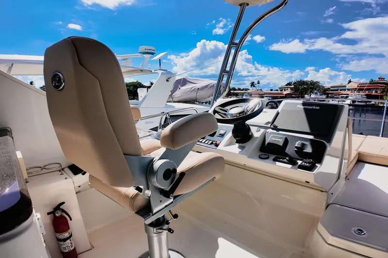 Slide: The Image of Luxurious 2016 Sea Ray L590 Fly yacht interior with elegant seating and modern design. - 21