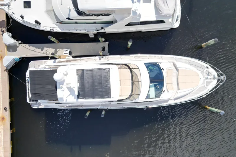 Slide: The Image of Overhead view of 2016 Sea Ray L590 Fly yacht docked at marina. - 28