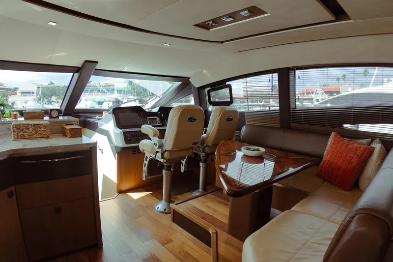 Slide: The Image of Luxurious interior of 2016 Sea Ray L590 Fly yacht with elegant seating and decor. - 7