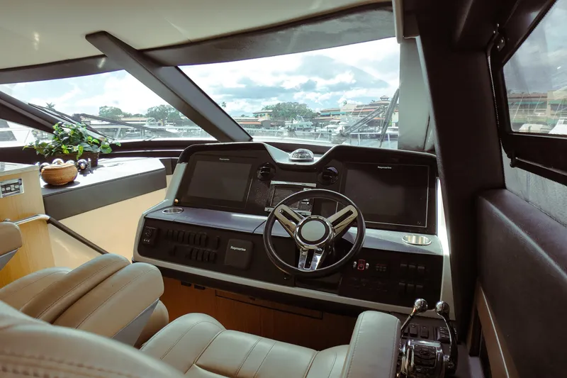 Slide: The Image of Luxurious interior of 2016 Sea Ray L590 Fly yacht with modern kitchen amenities. - 9