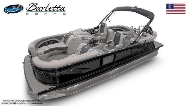 Slide: The Image of 2025 Barletta Corsa 23QCSS pontoon boat, sleek design, luxury seating, black and gray color scheme. - 2