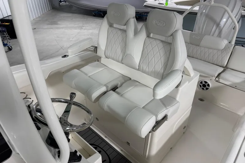 Slide: The Image of Luxurious seating in 2026 Key West 239 FSR boat, featuring premium white upholstery. - 10
