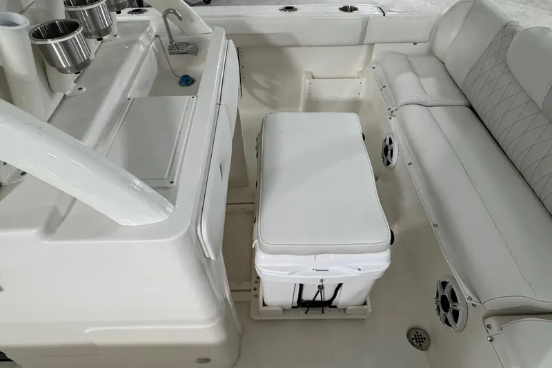 Slide: The Image of Interior of 2026 Key West 239 FSR boat with seating and storage. - 16