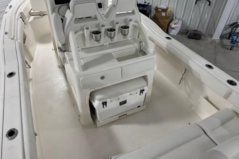 Slide: The Image of 2026 Key West 239 FSR boat interior with seating and storage compartments. - 20