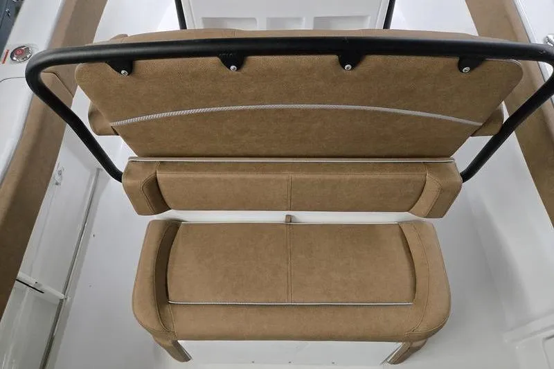 Slide: The Image of 2026 Sea Hunt Ultra 245 SE boat seating, tan upholstery, black frame, top view. - 4