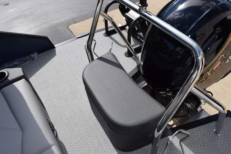 Slide: The Image of 2026 Evotti 521 CS boat interior with cushioned seating and sleek metal railing. - 12