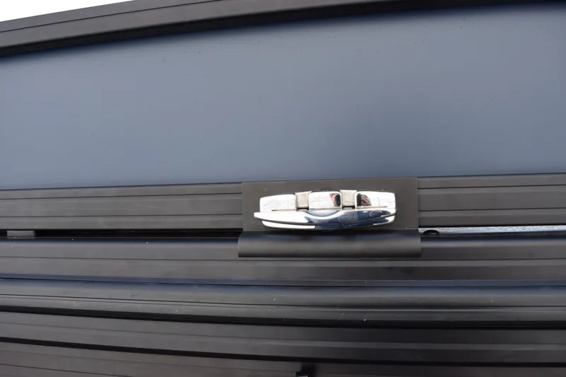 Slide: The Image of Close-up of 2026 Evotti 521 CS car door handle on a sleek black surface. - 8