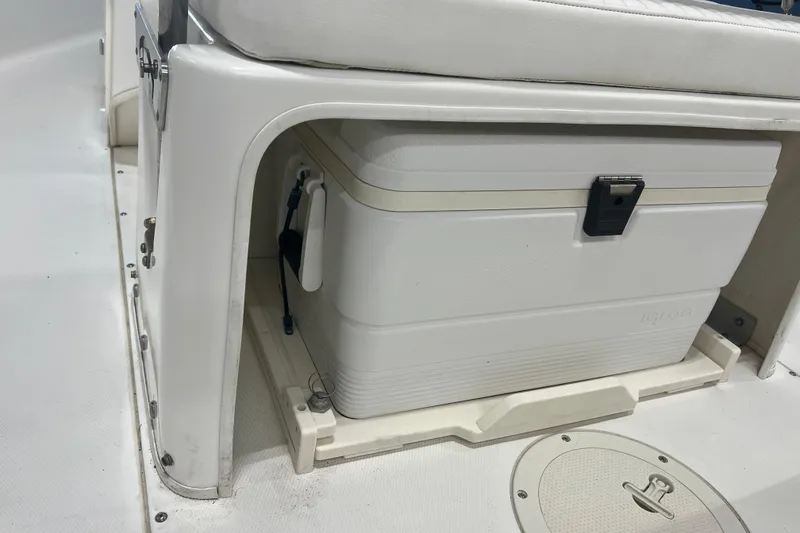 Slide: The Image of 2012 Boston Whaler 180 Dauntless boat interior with steering console and seating. - 8