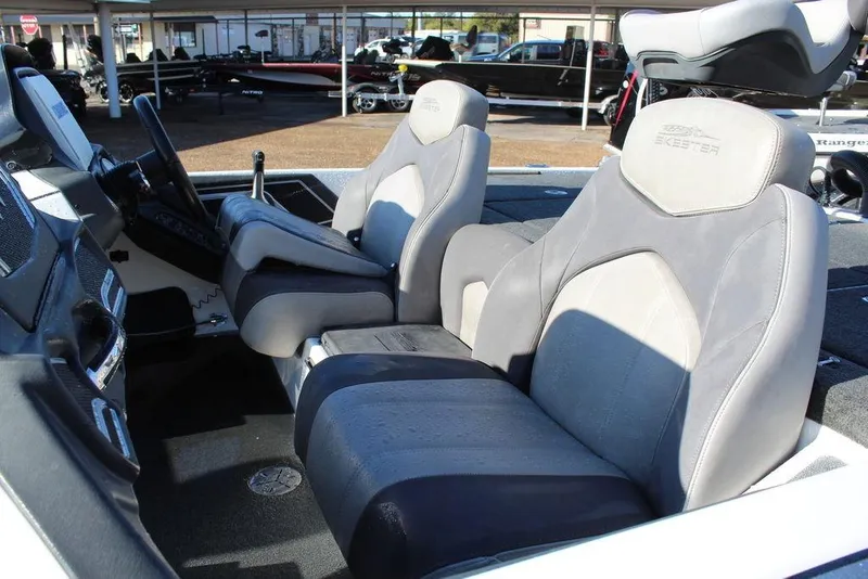 Slide: The Image of 2016 Skeeter FX21 Limited Edition boat interior with gray and white seating. - 6