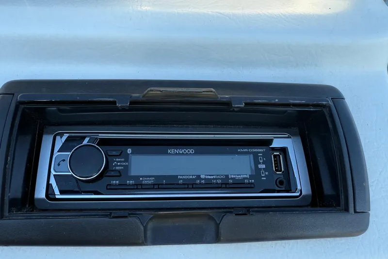 Slide: The Image of Kenwood stereo system in a 1997 Crest CREST II DLX boat dashboard. - 38