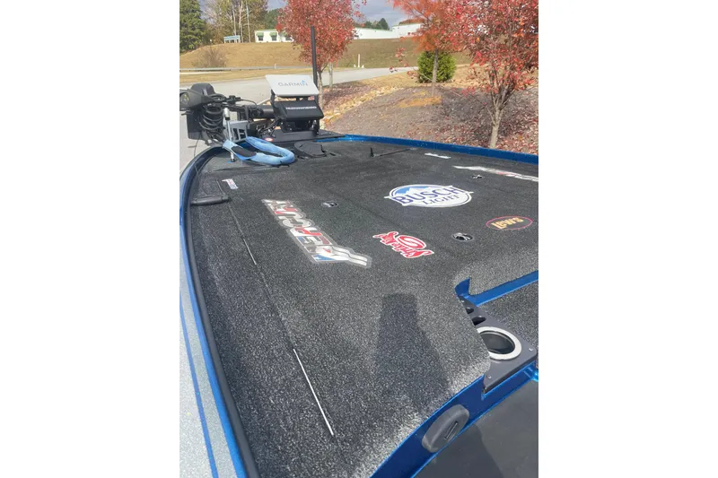 Slide: The Image of 2024 Nitro Z20 boat deck with sponsor logos and fishing equipment. - 6