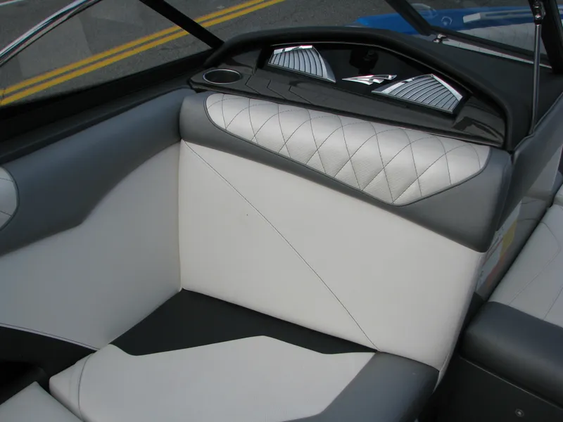 Slide: The Image of 2017 Tigé Z1 boat interior with gray and white leather seating. - 5
