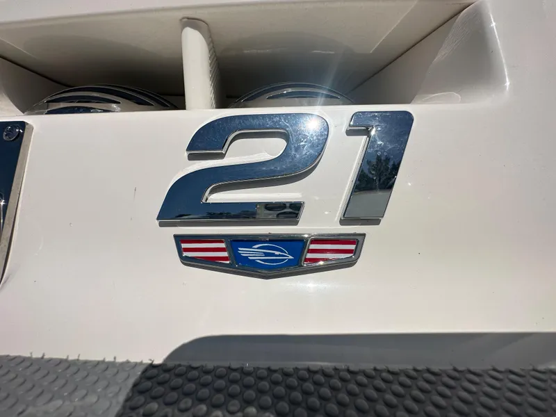 Slide: The Image of 2024 Chaparral 21 SSi OB boat model emblem close-up - 3
