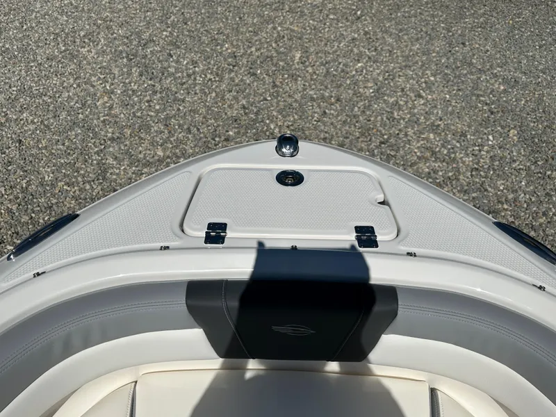 Slide: The Image of 2024 Chaparral 21 SSi OB boat bow with storage compartment. - 6