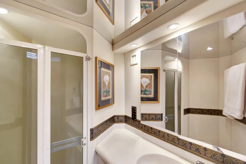 Slide: The Image of Luxurious bathroom interior of 2001 Viking 50 Convertible yacht with elegant decor. - 26