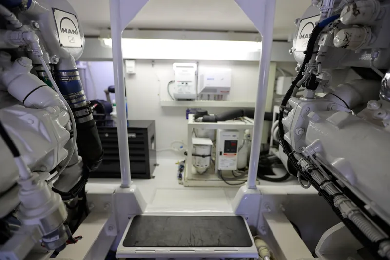 Slide: The Image of Engine room of 2001 Viking 50 Convertible yacht, featuring MAN engines and equipment. - 30