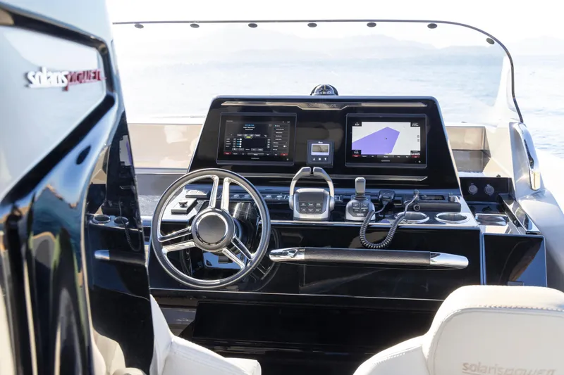 Slide: The Image of 2024 Solaris Power 40 Open yacht dashboard with modern navigation and control systems. - 12