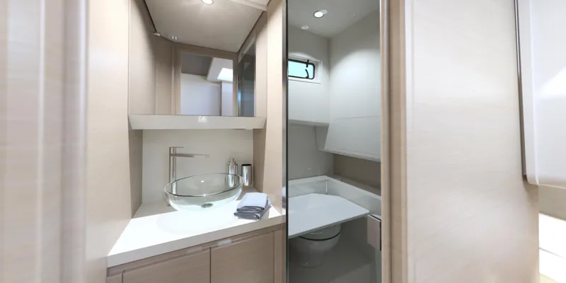 Slide: The Image of Modern bathroom in 2024 Solaris Power 40 Open yacht with glass sink and compact design. - 17