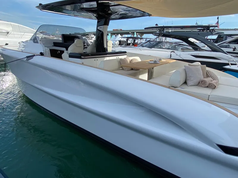 Slide: The Image of 2024 Solaris Power 40 Open luxury yacht docked at marina. - 8