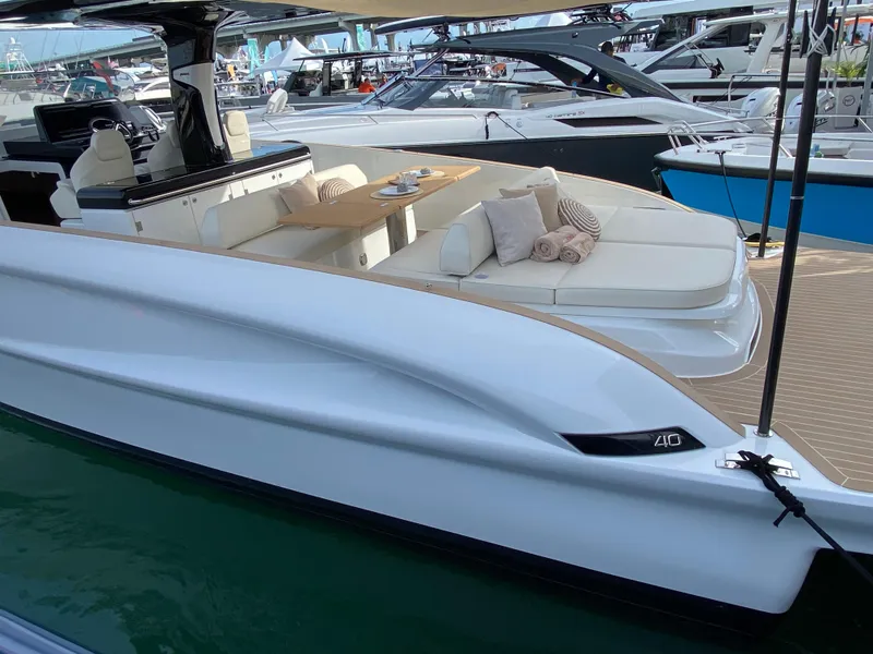 Slide: The Image of 2024 Solaris Power 40 Open luxury yacht with elegant seating and dining area. - 9