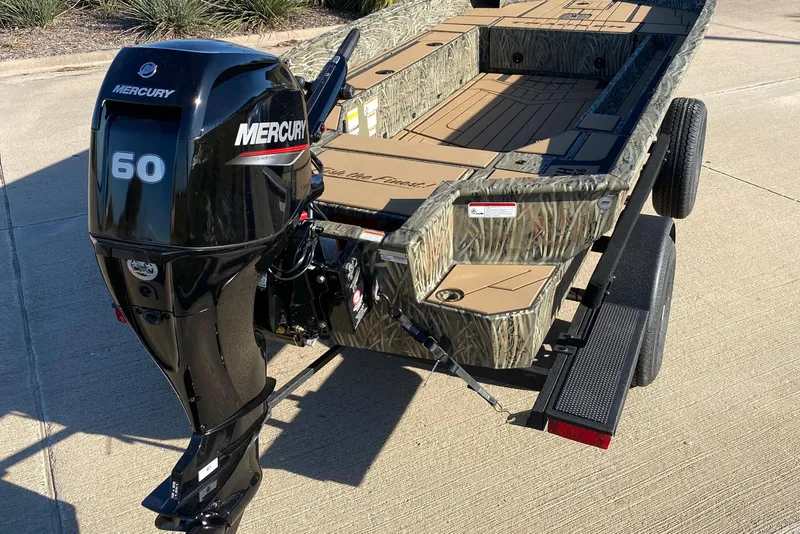 Slide: The Image of 2026 Tracker Grizzly 1756 T Marsh boat with Mercury 60 outboard motor. - 2