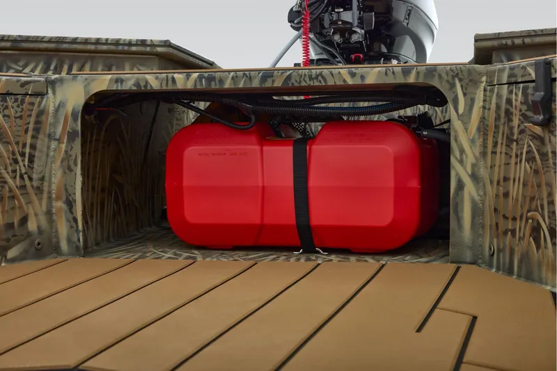 Slide: The Image of 2026 Tracker Grizzly 1756 T Marsh boat with red fuel tank and camo design. - 37