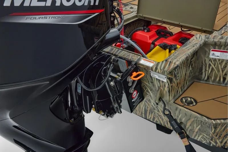 Slide: The Image of 2026 Tracker Grizzly 1756 T Marsh boat with Mercury FourStroke engine and camo design. - 42