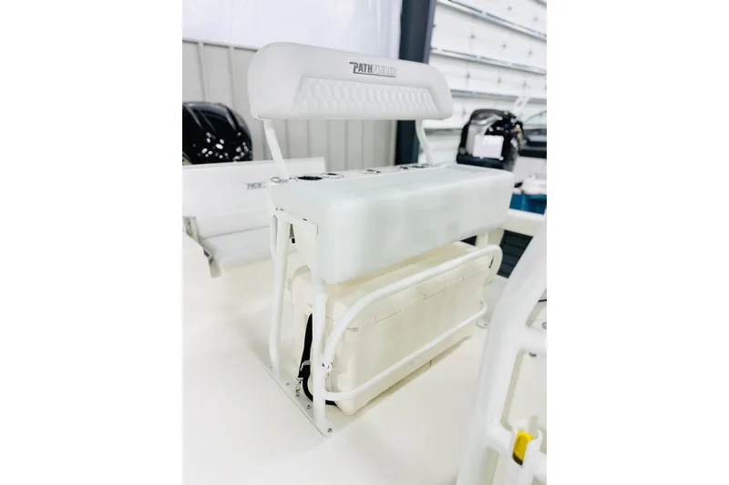 Slide: The Image of 2026 Pathfinder 2200 TRS boat seat with storage, white interior, modern design. - 4