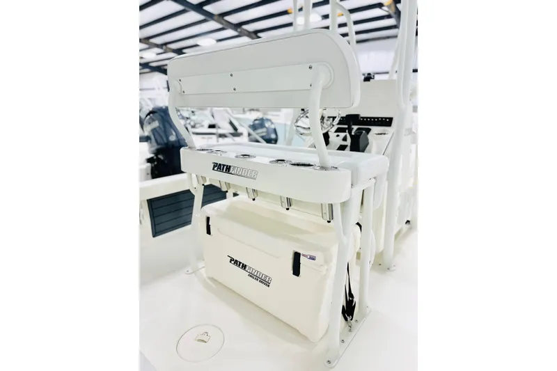 Slide: The Image of 2026 Pathfinder 2200 TRS boat interior with seating and storage features. - 5