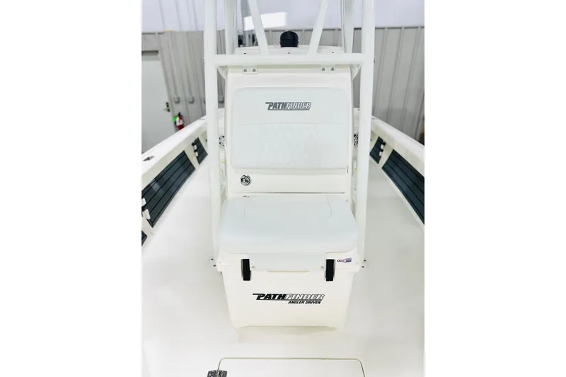 Slide: The Image of 2026 Pathfinder 2200 TRS boat interior with seating and storage. - 9