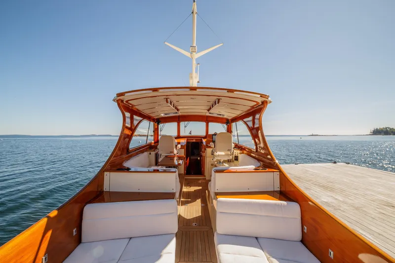 Slide: The Image of Hinckley Talaria 44 Express 2002 yacht interior with ocean view and elegant seating. - 20