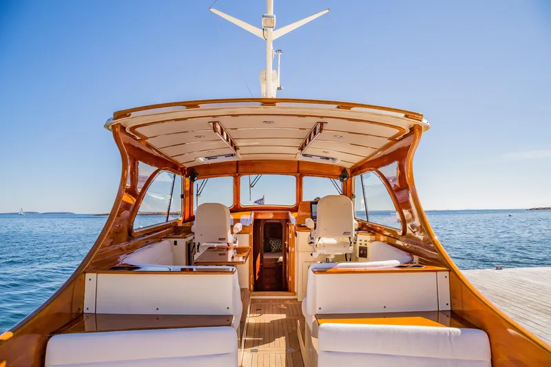 Slide: The Image of Hinckley Talaria 44 Express 2002 yacht interior with ocean view and elegant seating. - 21