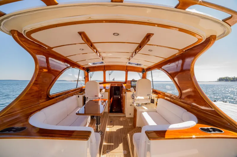 Slide: The Image of Luxurious 2002 Hinckley Talaria 44 Express yacht interior with elegant wood finish. - 22