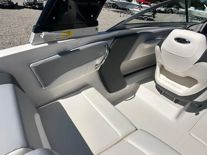 Slide: The Image of Interior of 2024 Chaparral 21 SSi OB boat with white and gray seating. - 47