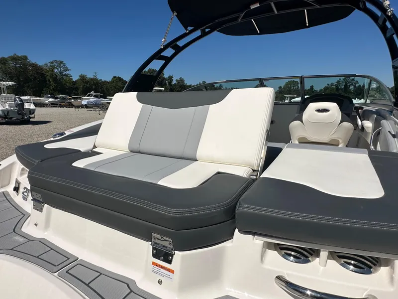 Slide: The Image of 2024 Chaparral 21 SSi OB boat with comfortable seating and sleek design. - 49