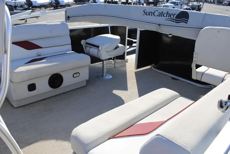 Slide: The Image of 2021 SunCatcher Select 22C pontoon boat interior with seating and helm. - 18