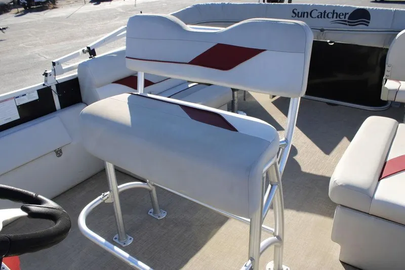 Slide: The Image of 2021 SunCatcher Select 22C boat interior with white and red seating. - 21