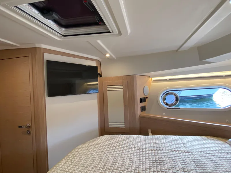 Slide: The Image of Luxurious cabin interior of 2026 Beneteau 41 Swift Trawler FLY with ocean view. - 34