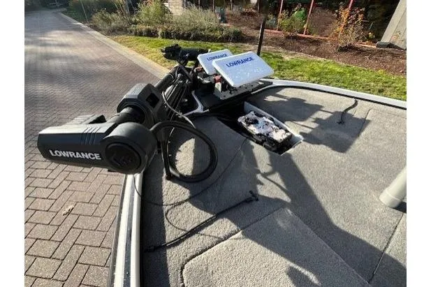 Slide: The Image of Fishing boat deck with Lowrance equipment, Nitro Z18 model, 2017, on a sunny day. - 5