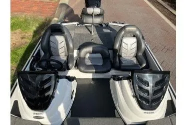 Slide: The Image of 2017 Nitro Z18 boat interior with dual seats and console design. - 8