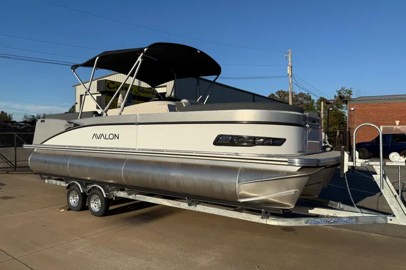 The Image of 2026 Avalon Catalina Entertainer pontoon boat on trailer, outdoor display. - 0