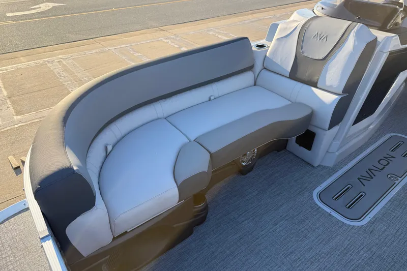 Slide: The Image of 2026 Avalon Catalina Entertainer boat interior with stylish seating and modern design. - 11
