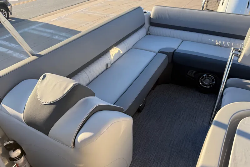 Slide: The Image of Luxurious seating on 2026 Avalon Catalina Entertainer boat, featuring sleek gray upholstery. - 23