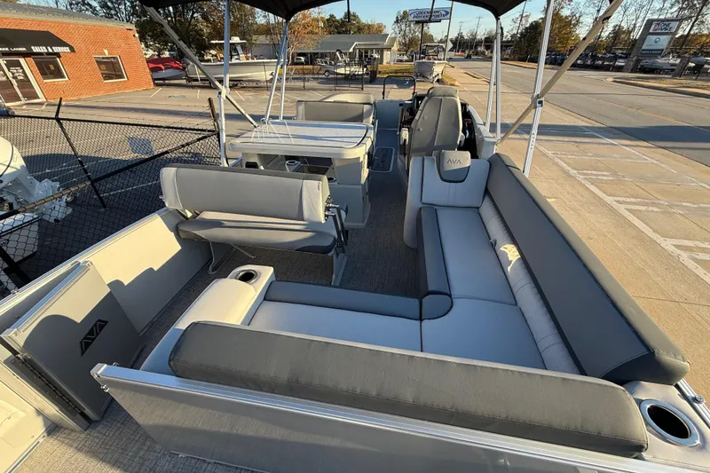 Slide: The Image of 2026 Avalon Catalina Entertainer pontoon boat interior with seating and canopy. - 30