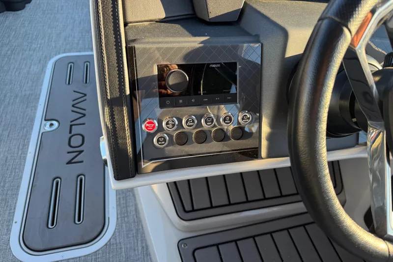 Slide: The Image of 2026 Avalon Catalina Entertainer dashboard with control panel and steering wheel. - 36