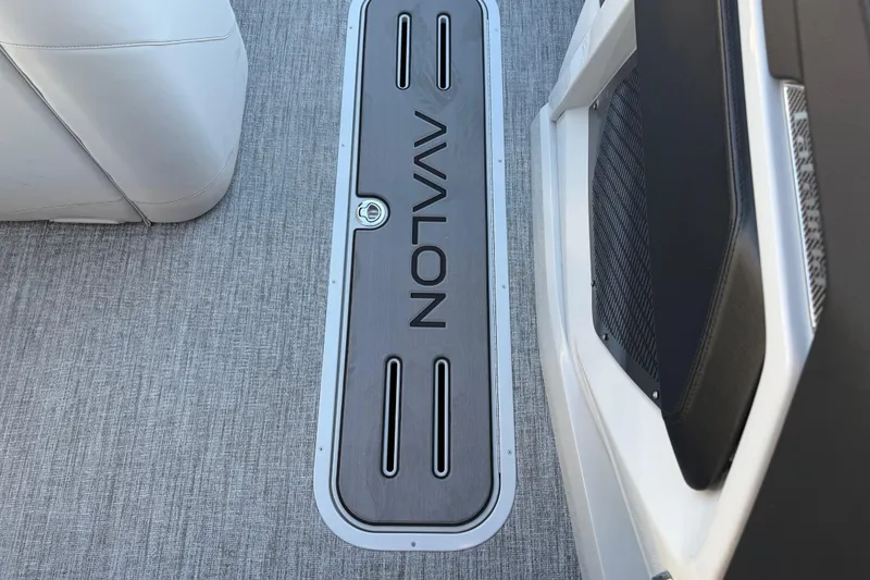 Slide: The Image of 2026 Avalon Catalina Entertainer boat interior with sleek flooring and seating. - 42