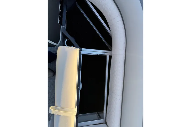 Slide: The Image of 2026 Avalon Catalina Entertainer boat interior with white cushioned seating and sleek design. - 50