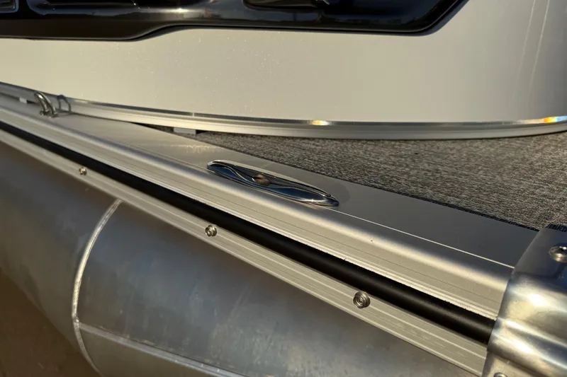 Slide: The Image of 2026 Avalon Catalina Entertainer pontoon boat detail with sleek aluminum finish. - 53
